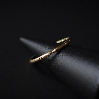 Spin - brass ringの画像