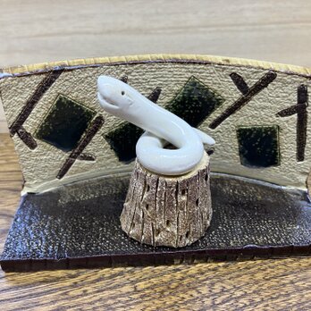 光背付き福巳置物の画像
