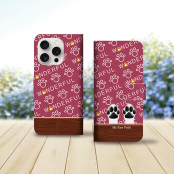 iPhoneスタンダード手帳型スマホケース （カメラ穴あり/はめ込みタイプ）【犬球（Two Paws）ボルドーレッド】の画像