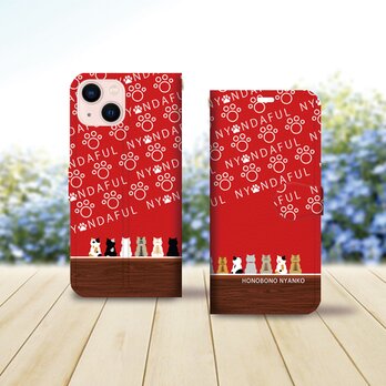 iPhone専用手帳型スマホケース （カメラ穴あり/はめ込み式/スタンド機能付き）【ほのぼのにゃんこ勢ぞろい】の画像