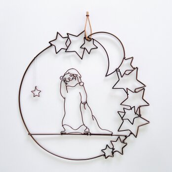 眠たいフェレットの星降るオーナメントの画像