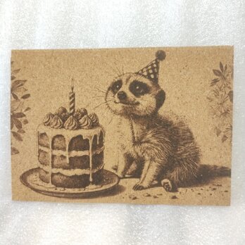 コルクシート　ミーアキャットとケーキの画像