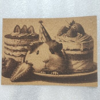 コルクシート　モルモットとケーキの画像