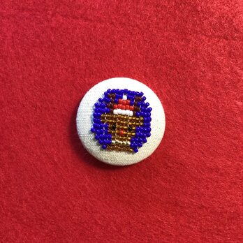 サンタの帽子をかぶったトナカイのクルミボタン（38mm）の画像