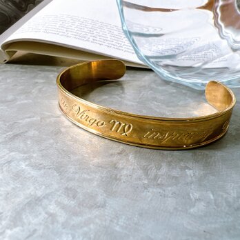BA63-【 AVON 】エイボン・ヴィンテージブレスレット 1979 Gold-tone cuff braceletの画像