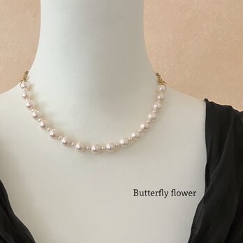 オレンジパールとリボンの首飾り　** Orange Pearl Necklace **の画像