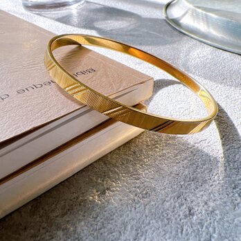 BM15-【 MONET 】モネ・ヴィンテージバングル Gold-tone subtle patternsの画像