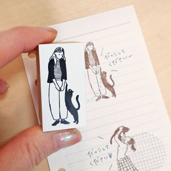 抱っこをせがむ猫ハンコの画像