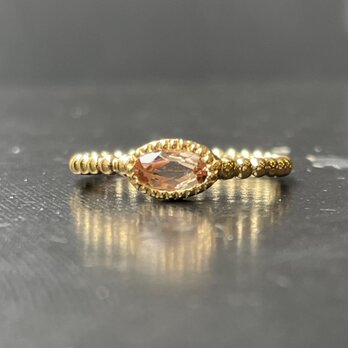 インペリアルトパーズ　オーバルカット0.69ct　ミル打ちと丸つぶ腕　シルバーSV925リングの画像