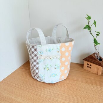 YUWAパッチワークのバケツ型小物入れの画像