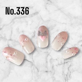 春のときめきを指先に♪リボン×ハートのゆめかわネイルチップの画像