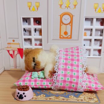 羊毛フェルト 気持ちよさそうにフトンに寝ている猫 ちゃんの画像