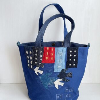 鳥が舞う月夜のビルヂング