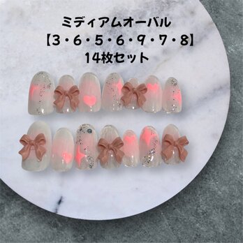【現品販売】ライトピンクときらめく手描きアートのガーリーニュアンスネイル｜14枚セット・ミディアムオーバル