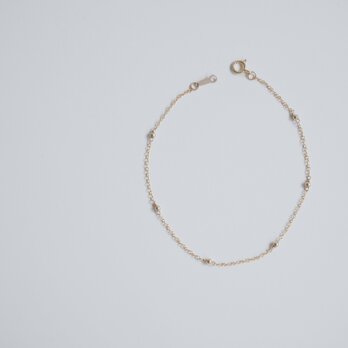 星屑 ｜14kgf 華奢なチェーンのゴールドブレスレット 【 長さオーダー可能 】の画像