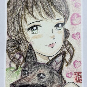 少女と犬の画像