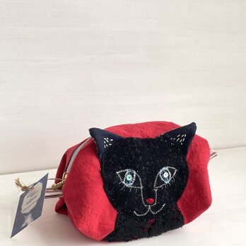 赤いお鼻の黒猫ポーチ