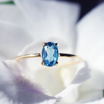 スイスブルートパーズ6mmのオーバルファセット爪留めリング・縦横可　～蒼穹（そうきゅう）