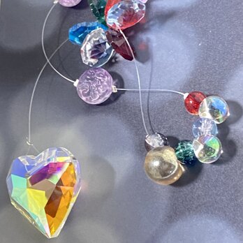 光を届けるハートのオーロラcrystalサンキャッチャー
