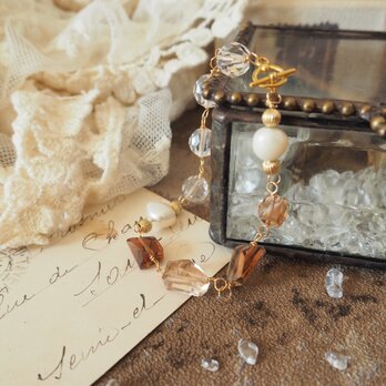 他人のエネルギーに影響されず、自分軸と境界線をしっかりと保つブラウントパーズとバッキーボール水晶のワイヤーブレスレット