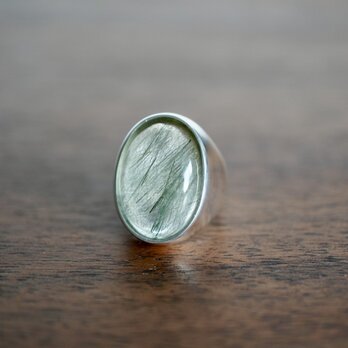 byssolite in quartz ring