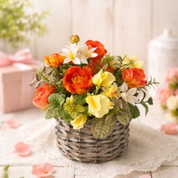 オレンジとイエローのナチュラルバスケットアレンジ