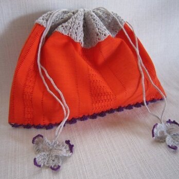オレンジ麻のふち編み巾着の画像
