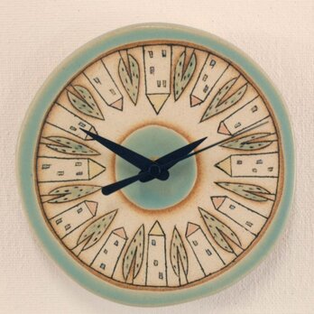 「家と木模様」の陶製時計の画像