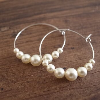 pearl hoop earringsの画像