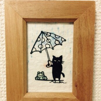 ミニ切り絵・なまいき猫ちゃん雨の日の画像