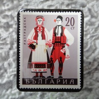　民族衣装切手ブローチ703の画像