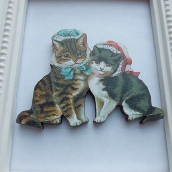 ㊙おしゃま姉妹の猫ちゃんのウッドブローチの画像