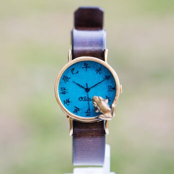 池をのぞく蛙腕時計M渋青緑の画像