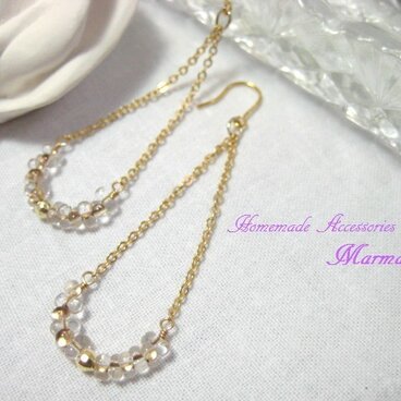 ファルファーレビーズのピアス(クリア×ブロンズ）