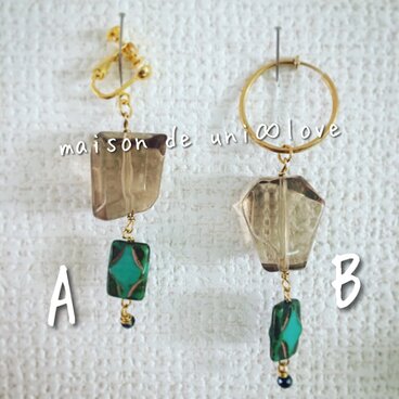 透明な氷の様なパーツのトライバル系イヤリング