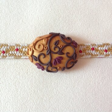 更紗模様の帯留め 金紗