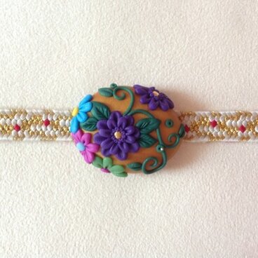 和柄の帯留め 金紗