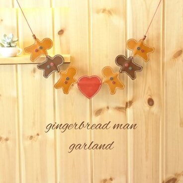 革でできたジンジャーマンクッキーのガーランド