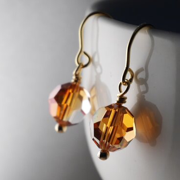 スワロの一粒ピアス　クリスタルカッパー