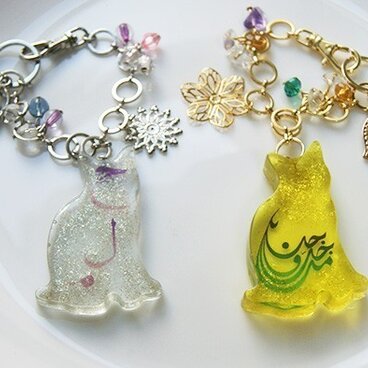 ネコとハムサの手のバックチャーム