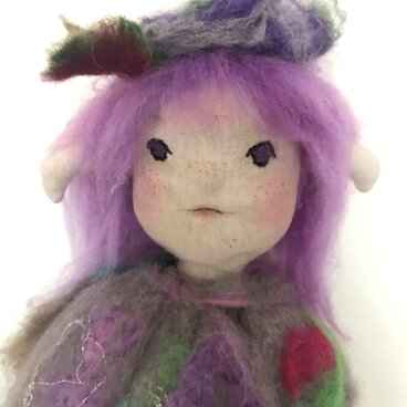 野原の中に座っていたよ。お花の精さん