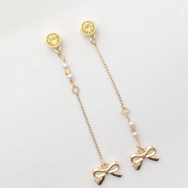 11月誕生石クリスタル フェミニンなリボンチャーム付ピアス/イヤリング