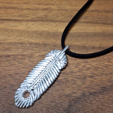 Peacock feather pendant.