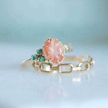 オレゴンサンストーン＆エメラルド  月桂樹モチーフのリング / K10YG 【１点限り】