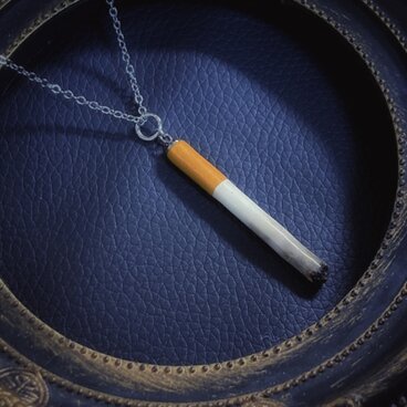 吸い殻のペンダント（銀）