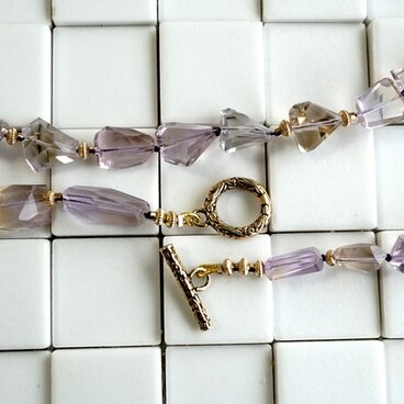 美しいアメトリンと深いゴールドビーズのネックレス