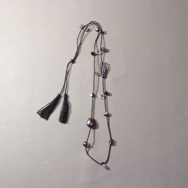 パールと石の編み込みネックレス