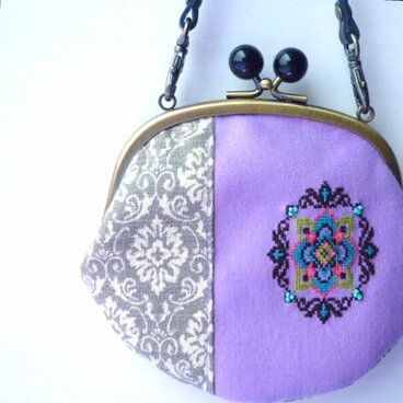 オクタグラム刺繍のバニラン織がまぐち財布