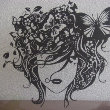 切り絵：蝶と女の子