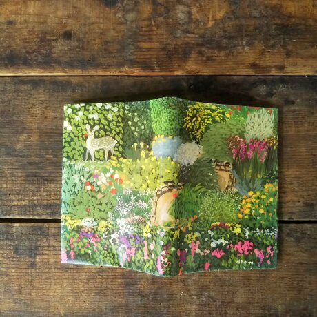 絵本なブックカバー『春の庭』の画像